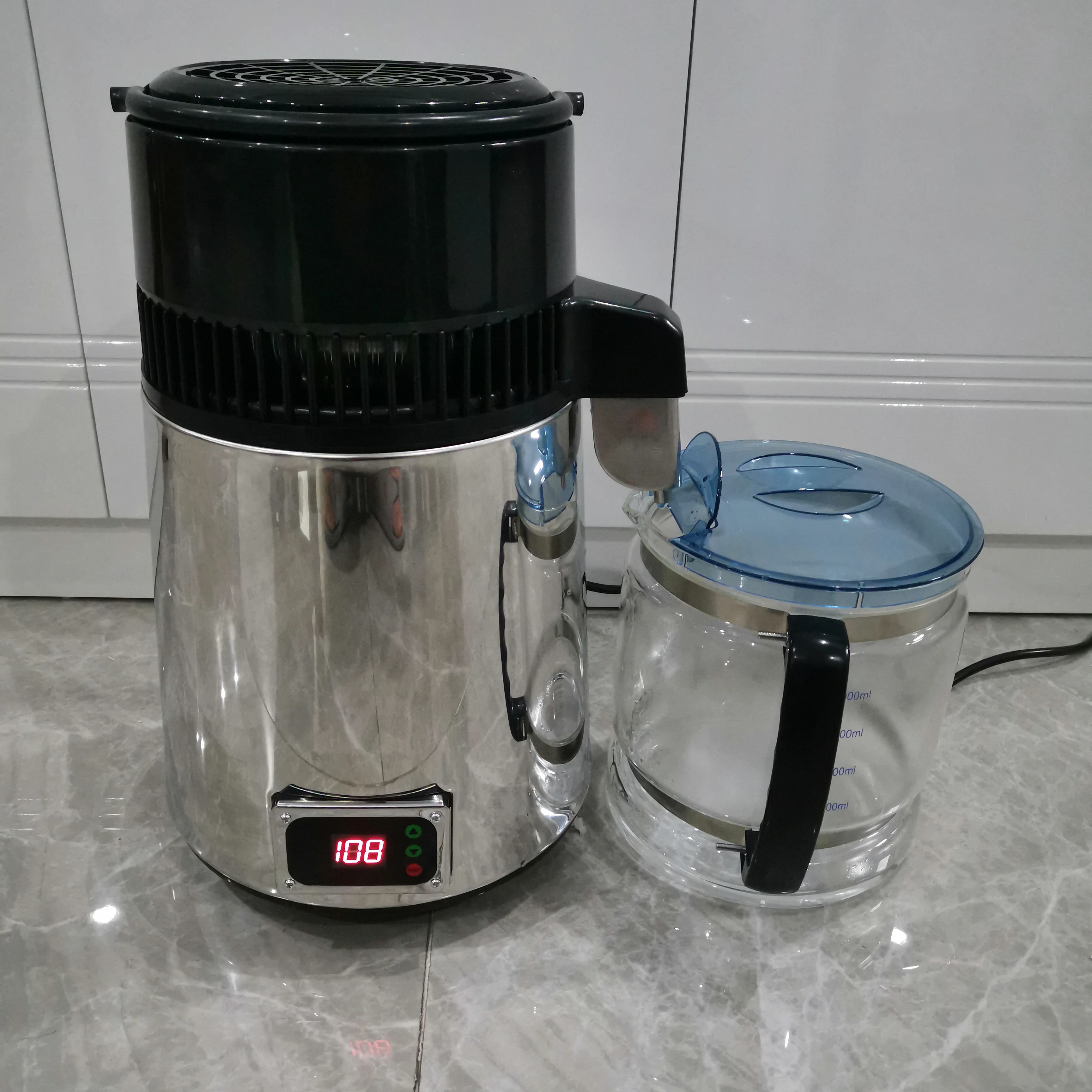 

Спиртовой дистиллятор, дистиллятор для чистой воды, машина для изготовления дистиллированной воды, очиститель воды из нержавеющей стали, 750...