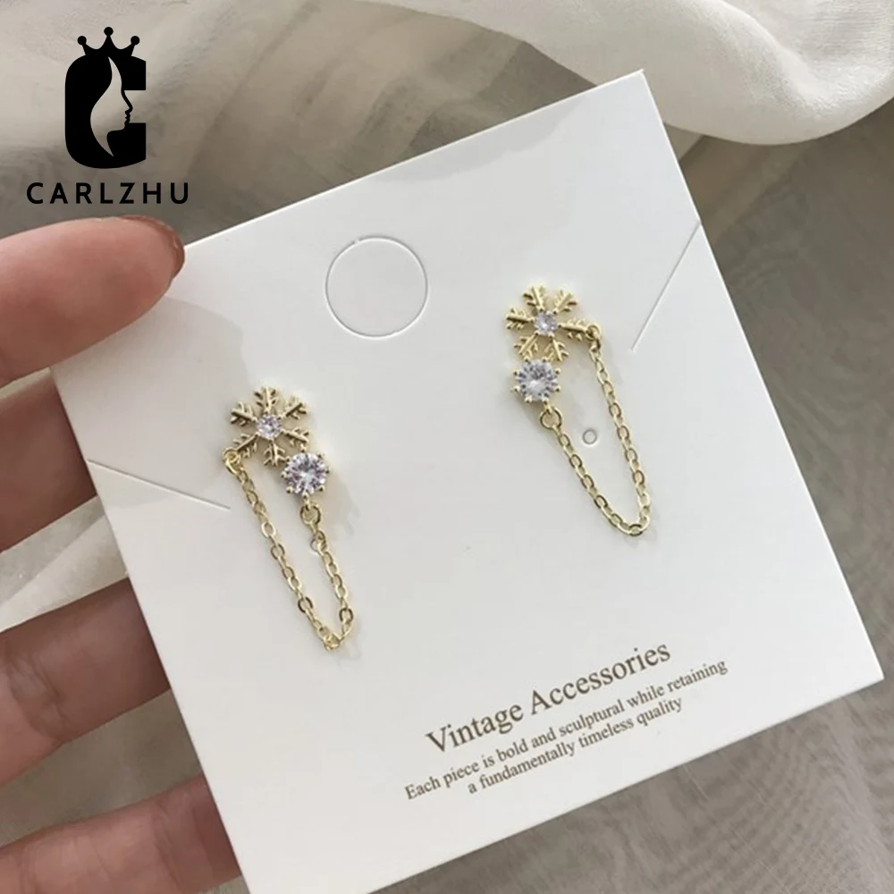 Женские серьги-гвоздики из серебра 925 пробы с позолоченными снежинками |