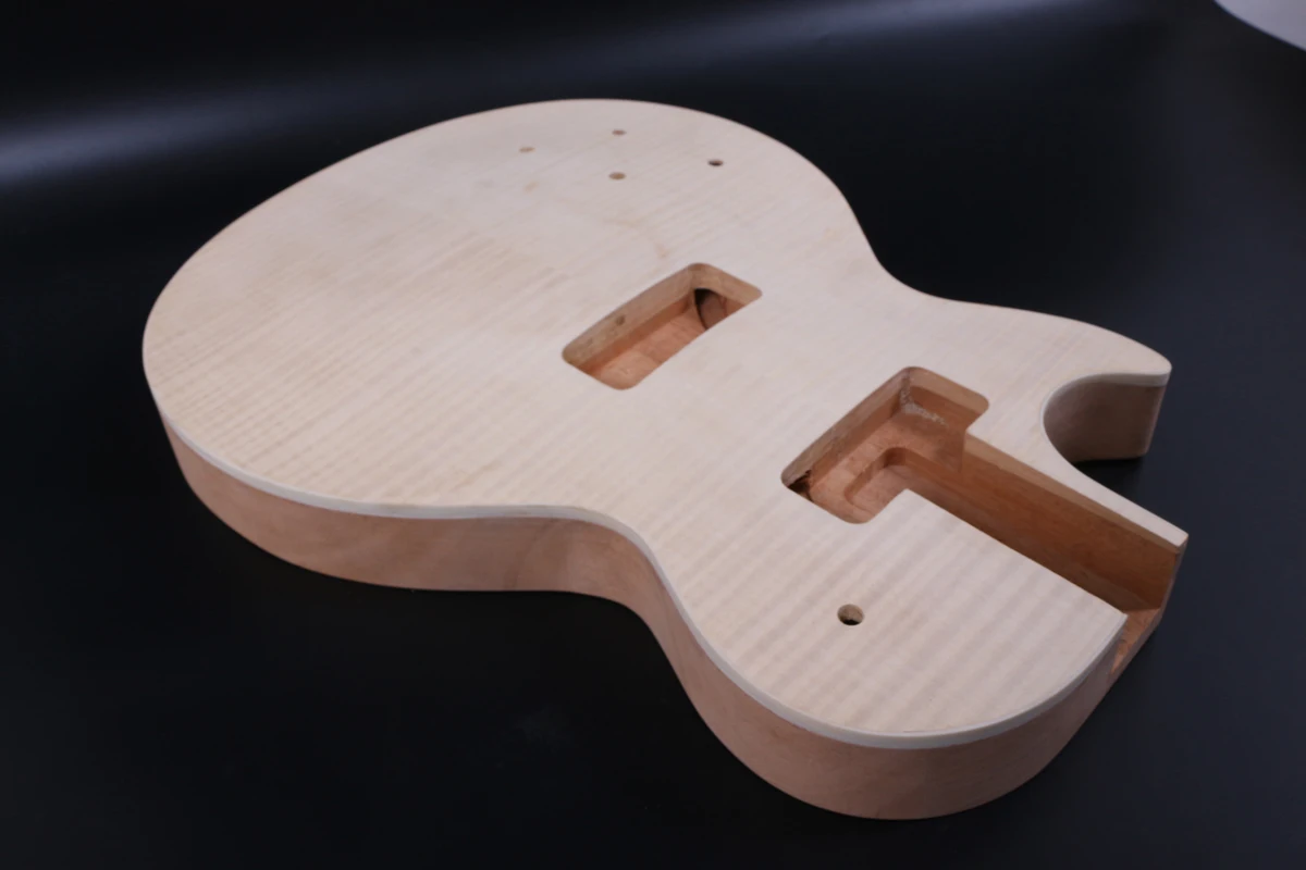 

ONE LEFT HAND ELECTRIC GUITAR BODY MAHOGANY Made and maple top