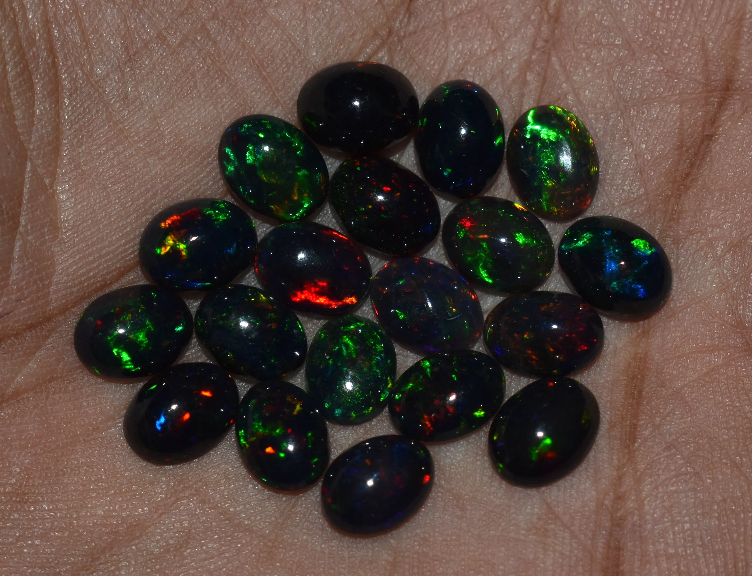 0.85ct 0.17g Gemstones-Ethiopian Black Opal Cabs Oval 7x5mm Approximatly
