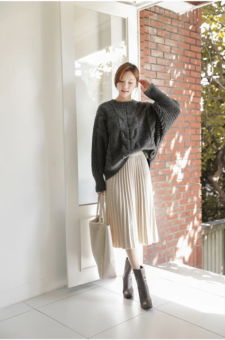 

Women's skirt 2019 long autumn and winter ins knitted half-length pleated skirt solid color wool skirt