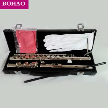 

16 closed hole flute , nickel Plated, E key