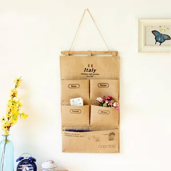 

Jute 5 Pocket Hanging Bag Multi-function Cotton and Linen Storage Key Remote Control Pen Debris Storage 040 y