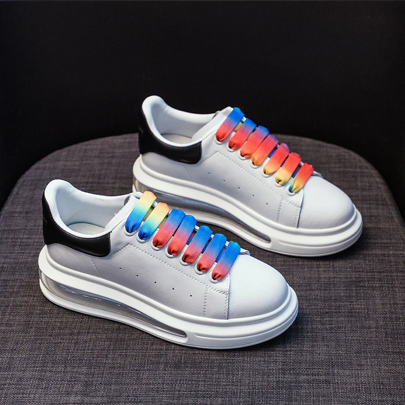 white shoes with rainbow laces