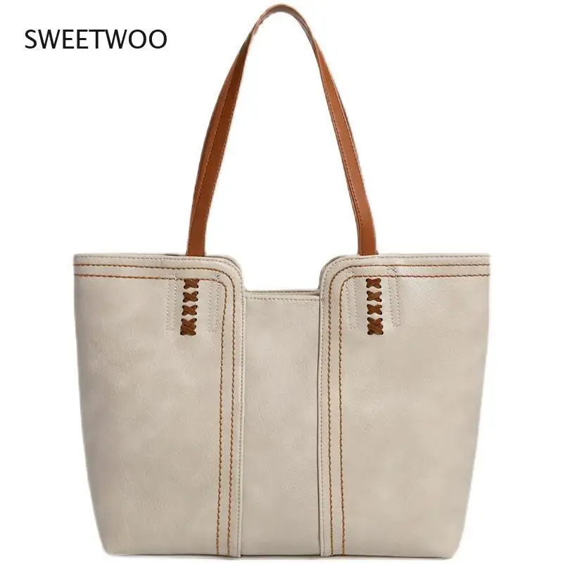 

2021 autumn and winter Korean fashion tote bag wild retro one-shoulder portable commuter big bag female