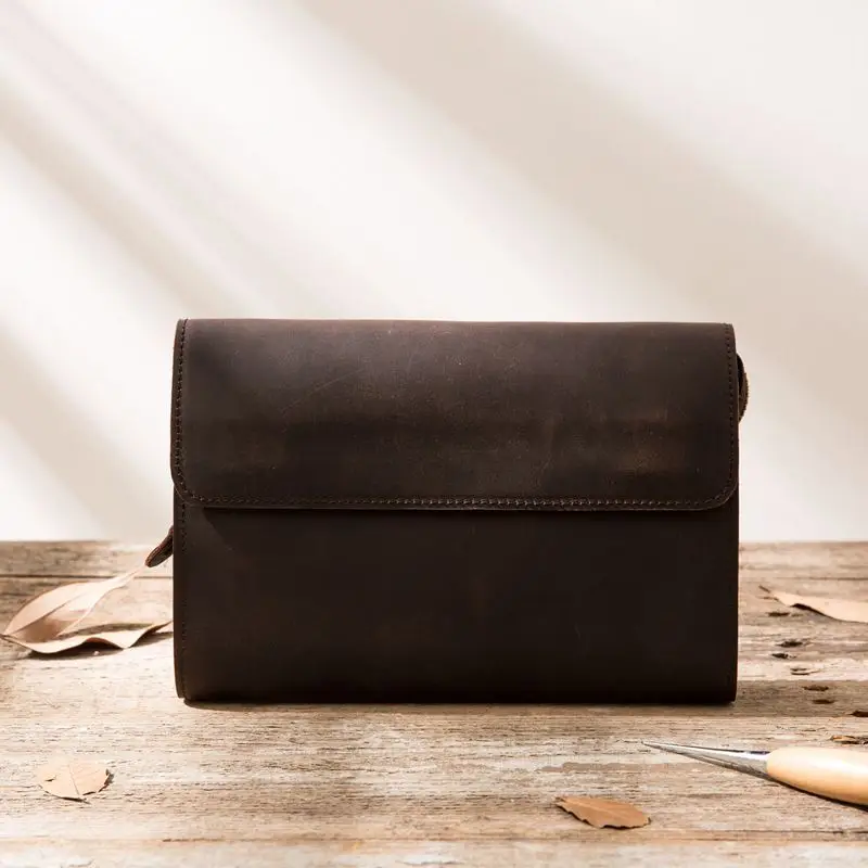 

The Original Hand Holds The Bag Male Retro Wallet Leisure Small Hand Grabs The Bag.