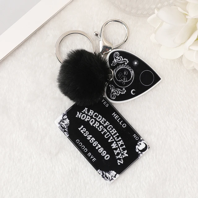 Introducing the Women Ouija Planchette Keychain: A Charming Accessory for Every Occasion