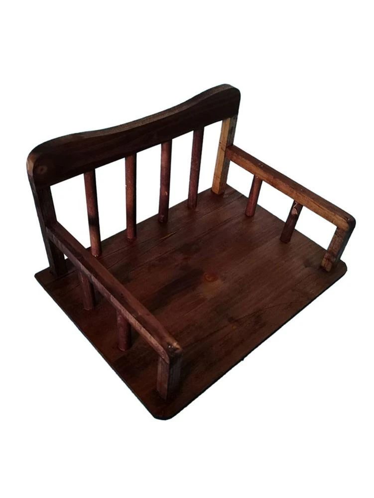 small wooden cot