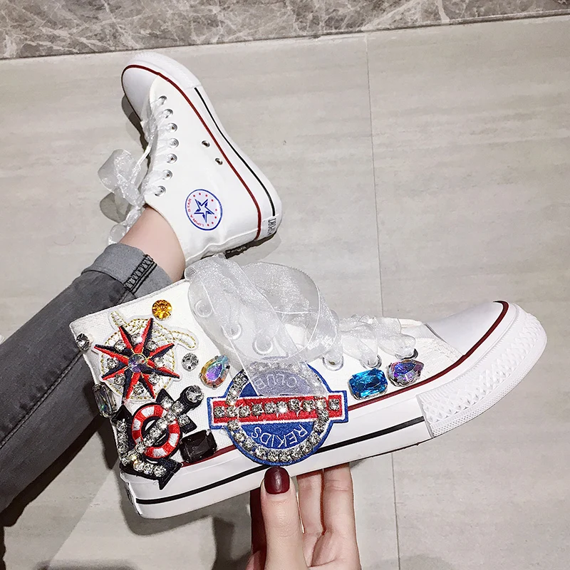 white sneakers with flowers