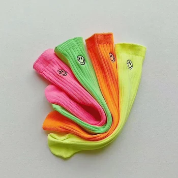 

Girl Western fluorescent color socks 2019 spring and autumn children's baby smiley face socks piled socks foreign cotton socks