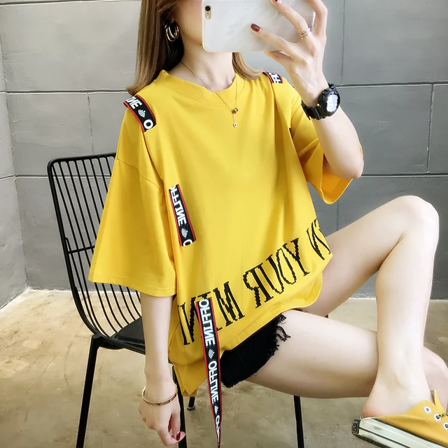 white top yellow sleeves