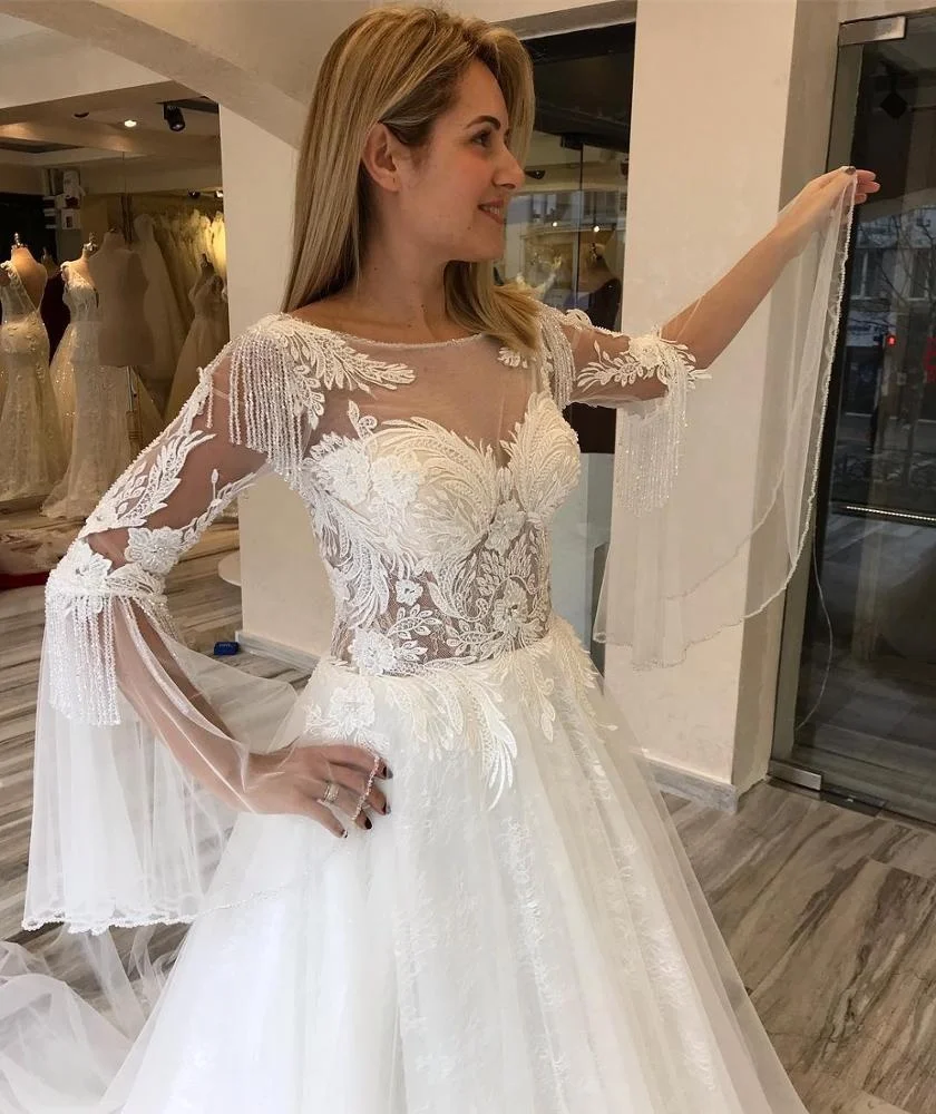 New Design A Line Wedding Dress Sheer Neck Long Sleeve Tassel Lace Glitter Bridal Gowns Graceful Robe de mariee