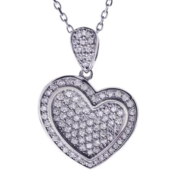 

Heart-shaped pendant sterling silver 925mls with to microengastado in zircons high quality.