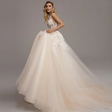 

Bridal gown Traugel Sexy V Neck A Line Beach Lace Wedding Dress Elegant Tank Sleeve Backless Bridal Dress Court Train Wedding