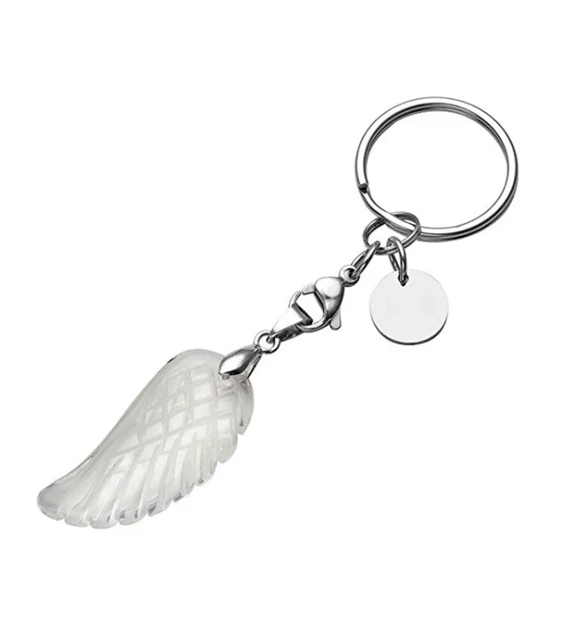 

FYJS Unique Silver Plated Circle Lobster Clasp Natural Rock Crystal Angel Wing Key Chain Attractive Design Jewelry