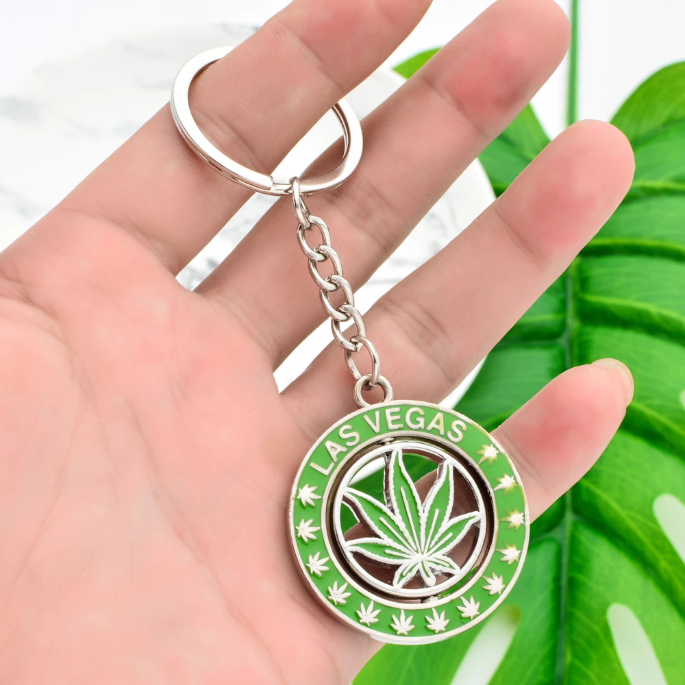 

Vicney Rotatable Las Vegas Cannabi Leaf Key Chain Light Green Plant Keychain For Men Women Zinc Alloy Round keyring For Friends