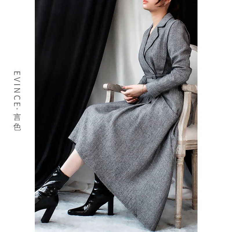 

Age reducing slim design dress irregular fashion Royal sister temperament light mature wind autumn and winter waist wool skirt