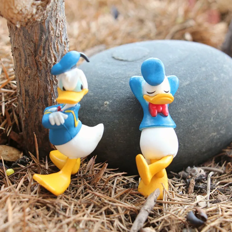 

Disney 2pcs Donald Duck Action Figure toys DIY decoration materials baking cake decoration ornaments Micro landscape home decor
