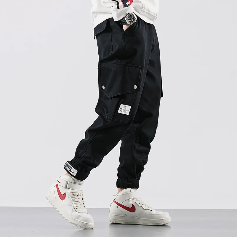 

Fashion Streetwear Men Jeans Loose Fit Multi Pockets Casual Cargo Pants Harem Trouser Japanese Designer Hip Hop Jogger Pants Men