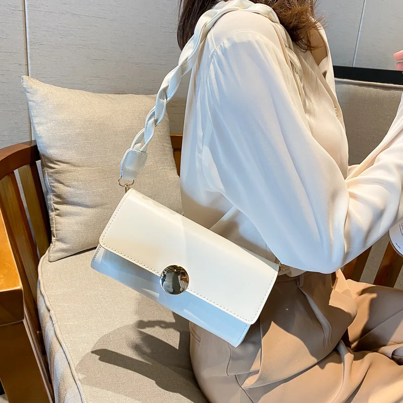 

2020 new retro shoulder strap bag female Japanese simple solid color single shoulder texture versatile armpit bag