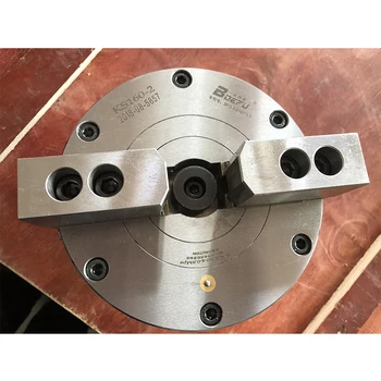 

In the middle is a solid two-jaw pneumatic chuck steel body KS160-2 CNC lathe machine chuck