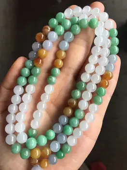 

Burma yu a good species of three-color golden green white fluorescent round beads yu Necklace