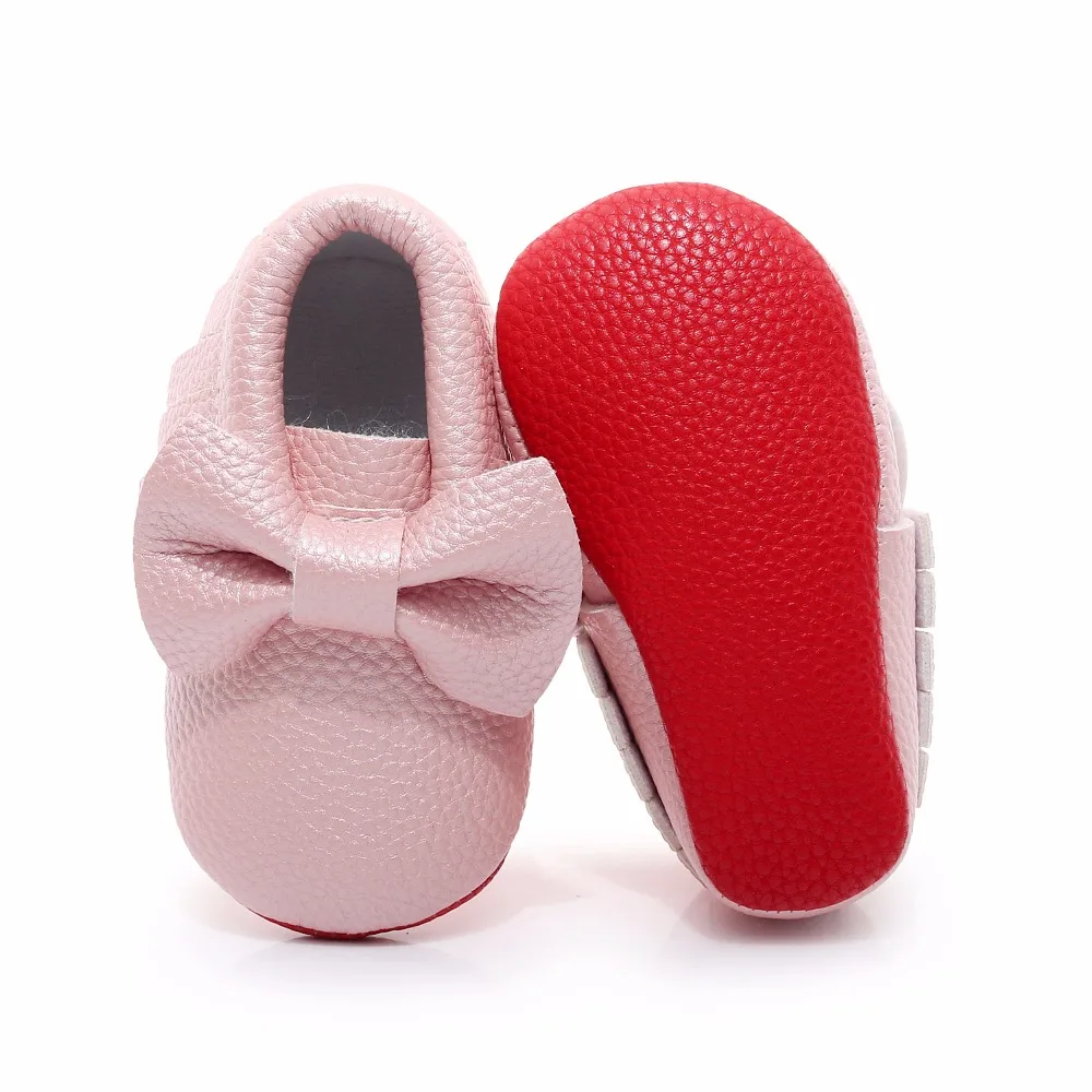 baby shoes with red bottoms