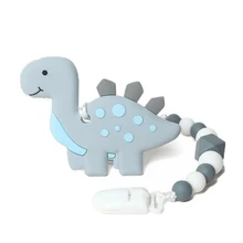 Cheap Baby Teeth Toys Dinosaur Teether Pain Relief Toy With Pacifier Clip Holder Set For Newborn Babies Neutral Shower Gift Cheap Baby Teeth Toys Dinosaur Teether Pain Relief Toy With Pacifier Clip Holder Set For Newborn Babies Neutral Shower Gift