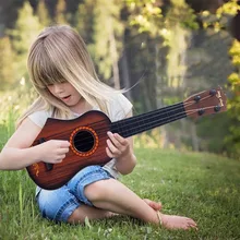 17 дюймов Гавайские гитары укулеле четыре струнные гитары для начинающих музыкальные звуковые игрушки дети могут играть на гитаре лучший подарок для детей
