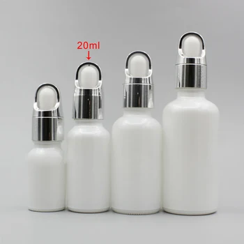 

Empty 20ml Pearl White Essential Oil Glass Bottle with Silver Flower Basket Cover