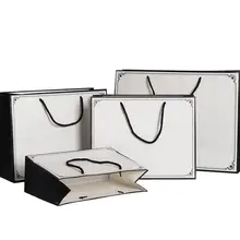 Изготовленные на заказ Роскошные брендовые бумажные хозяйственные сумки с ручками 100 шт для розничной одежды обуви бутик косметики DIY белые бумажные доски сумки