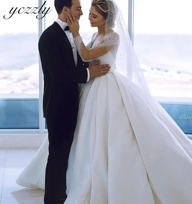 Luxury O-neck Ball Gown Crystal Diamond Satin Wedding Dress Long Sleeves Lace Plus Size Arabic Wedding Dress Vestido Novia W209 Luxury O-neck Ball Gown Crystal Diamond Satin Wedding Dress Long Sleeves Lace Plus Size Arabic Wedding Dress Vestido Novia W209