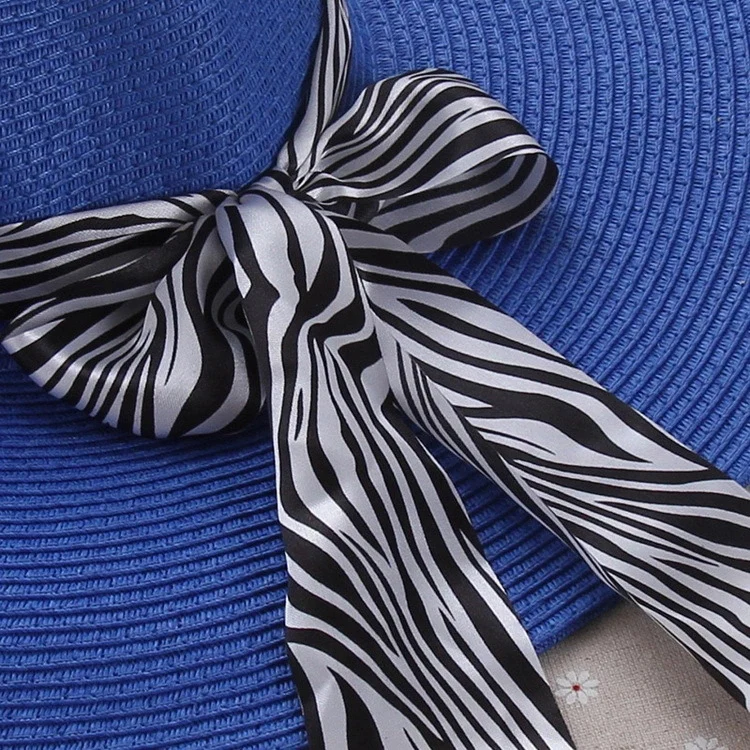 

Chiffon scarf skirt with straw hat on Lady beach with ribbon on waistband with ribbon leopard pattern flower rainbow