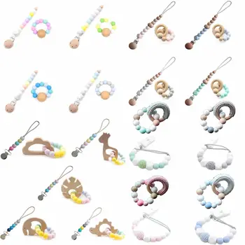 

Baby Silicone Teether Wood Ring Bracelet Pacifier Chain Holder Newborn Molar Toy