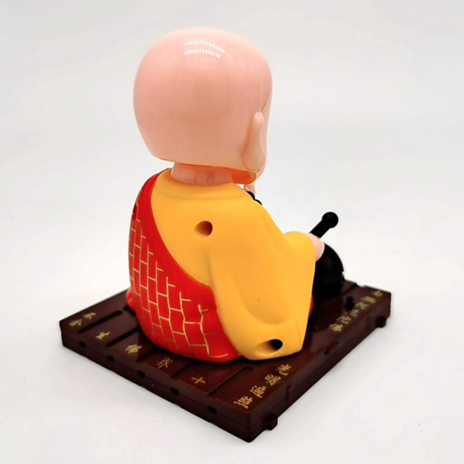 Solar Power Dancing Toy Buddhist Monk Nodding Head Toy Car Decoration Yellow