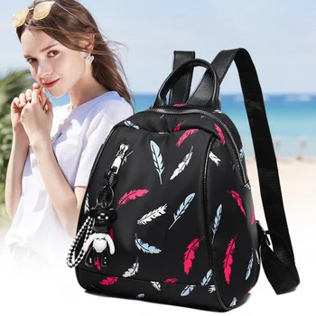 

Backpack female 2019 new tide Feather pattern bag female school wild fashion Oxford cloth fashion Travel backpack female