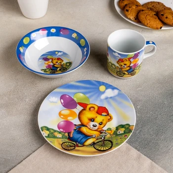 

A set of children's dishes "Bear on a Bicycle", 3 pieces: mug 230 ml, bowl 400 ml, plate 18 cm