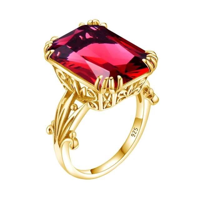 Classic Ruby and Diamond Three Stone Engagement Ring