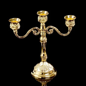 

Metal candlestick for 3 candles "Carved sheet" gold color 21x20.5x8.5 cm