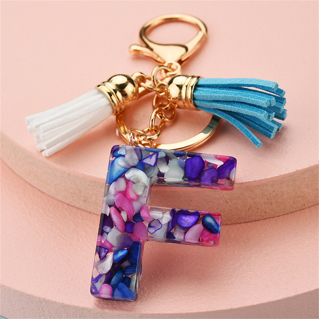 Women Keychains 26 Glitter Hollowed-out Words Handbag Tassel English Letter Keyring with Puffer Ball Charms Free Shipping
