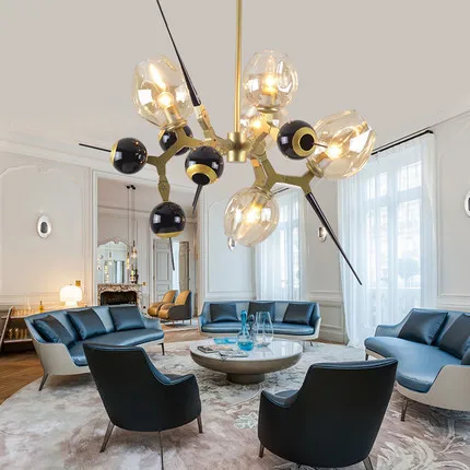 

In the back of the modern living room, there are chandeliers with Nordic crystal balls