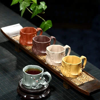 

Purple clay plum tea cup yixing mug