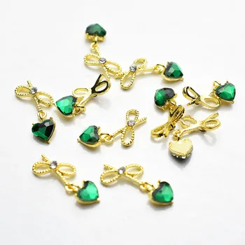 

100Pcs Gold Bowknot Korean 3D Nail Art Decorations Rhinestone Crystal Pendant Heart Charms Nails Accessories DIY Manicure Charm