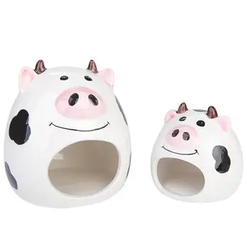 

2pcs Hamster Nest Cages Cow Shape Ceramic Pet Nest Cartoon Hamster Living House (Black And White)
