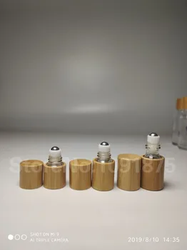 

50pcs/lot 1ml 2ml 3ml Natural Bamboo Refillable Empty Essential Oil Perfume Fragrance Scent Steel Roller Ball Bottle