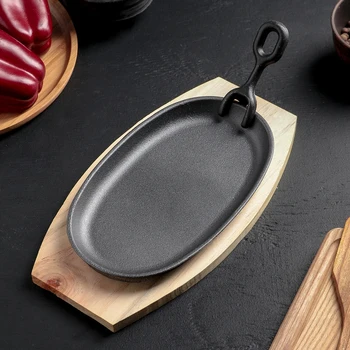 

Frying pan 23.5x14 cm "Oval" with a holder, on a wooden stand