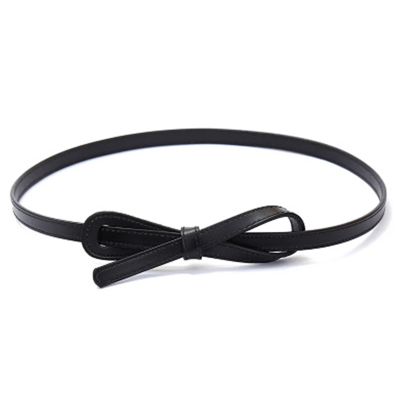 Кожаный тонкий пояс дамы с платье завязанный декоративный белым поясом ретро