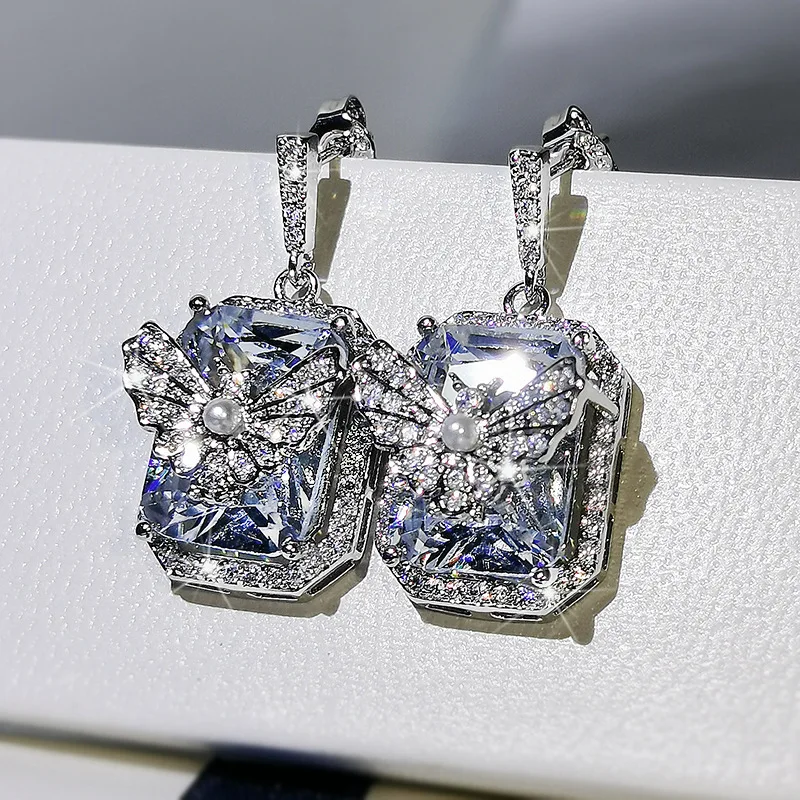 

Diamond 925 серебряные серьги для женщин в стиле панк синего цвета, свадебные ювелирные украшения Мода бабочка золотые серьги перо юбилейные пок...