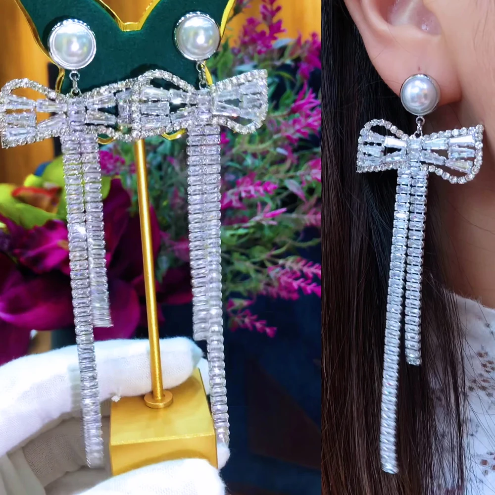 

Soramoore 2022 Luxury Trendy Charm Long Bowknot Pendant Earrings Full Mirco Paved Crystal Zircon Dubai Wedding Earrings Jewelry