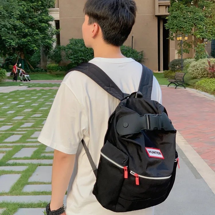Hunter-mochila grande para hombre y mujer, bolso de ocio, a prueba de lluvia, ligera, tendencia con botón superior, mochila escolar para ordenador